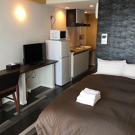 มิสเตอร์คินโจะ อิน นิชิฮาระ อินเตอร์เชนจ์ Aparthotel กิโนวัน ภายนอก รูปภาพ