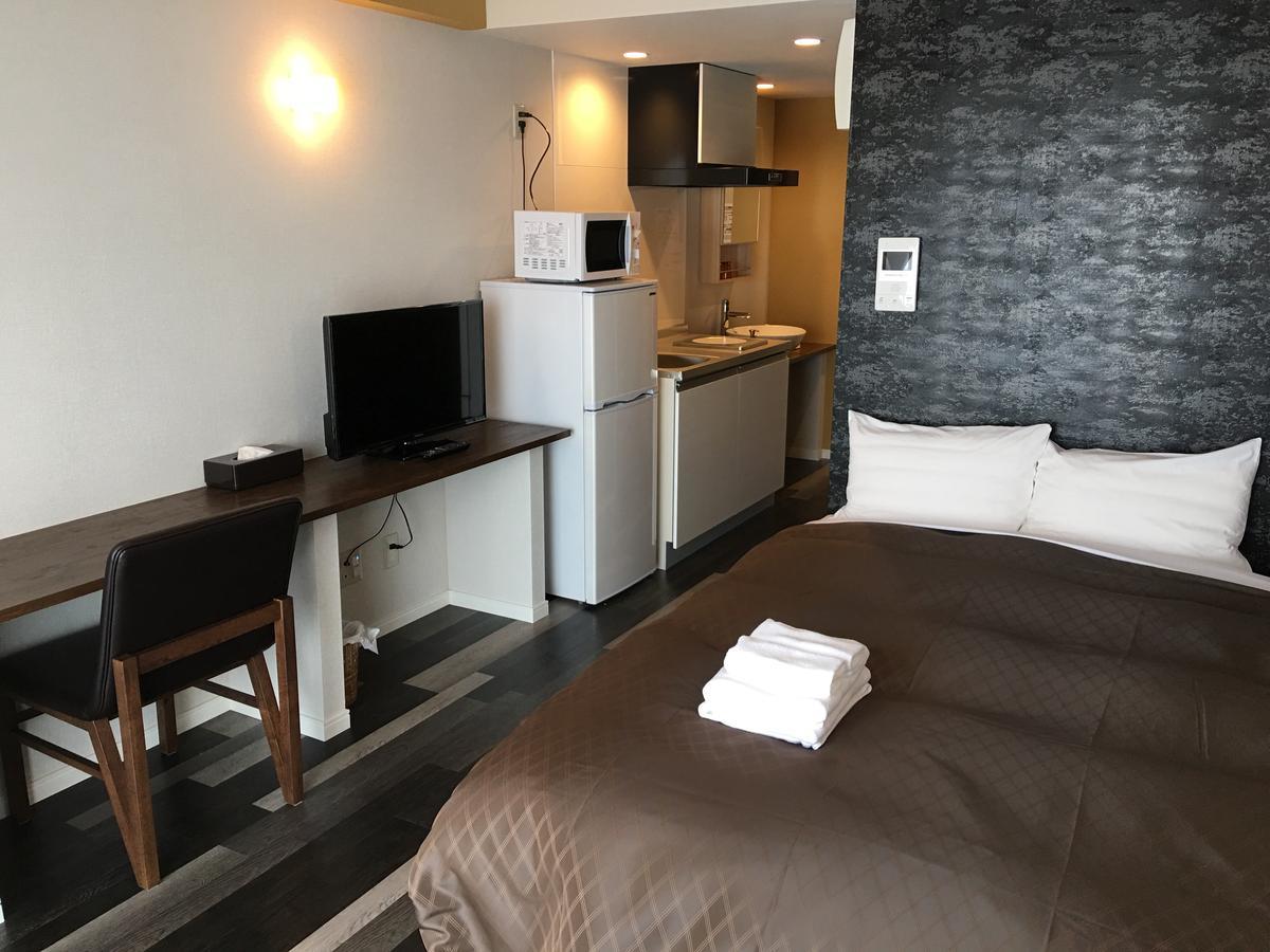 มิสเตอร์คินโจะ อิน นิชิฮาระ อินเตอร์เชนจ์ Aparthotel กิโนวัน ภายนอก รูปภาพ